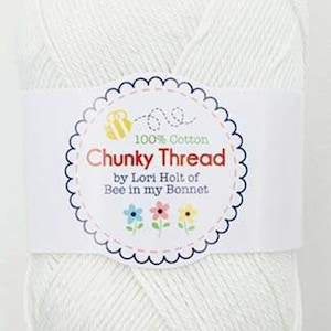 May include: A white ball of 100% cotton yarn labeled "Chunky Thread by Lori Holt of Bee in my Bonnet".