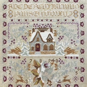 May include: Cross-stitch sampler featuring a winter scene with a snow-covered house, rabbits, and deer. The design includes floral and geometric borders, with numbers and letters. The color palette includes beige, brown, and purple.