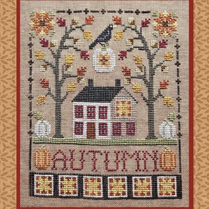 May include: Cross-stitch design featuring a house, pumpkins, and trees with fall foliage. A black bird perches on a pumpkin. The word "AUTUMN" is stitched below the house. The color palette includes shades of brown, orange, yellow, and red.