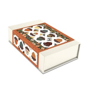 May include: A rectangular, off-white box with a decorative band featuring a quilt-like pattern. The band showcases geometric shapes in shades of brown, green, and yellow, set against a floral background. The box has a clean, modern design.