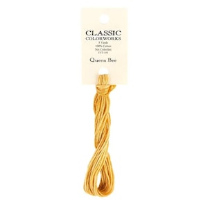 May include: A skein of Queen Bee embroidery floss, a light yellow color, from Classic Colorworks. The floss is 100% cotton and is 5 yards long. The label says "Not Colorfast" and "CCT-188".