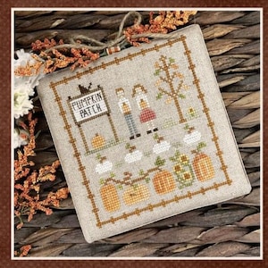 May include: A cross-stitch embroidery design featuring a pumpkin patch scene with two figures, a sign that reads "Pumpkin Patch", and pumpkins in various stages of growth.