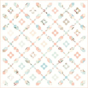 May include: A white quilt with a repeating pattern of pink and blue squares and flowers. The quilt is made with a variety of fabrics, including floral prints, stripes, and solids.