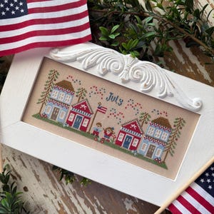 Country Cottage Needleworks Monthly Mini Village July Cross Stitch Pattern - Patriotic  Cross Stitch ~ Anabella's Cross Stitch