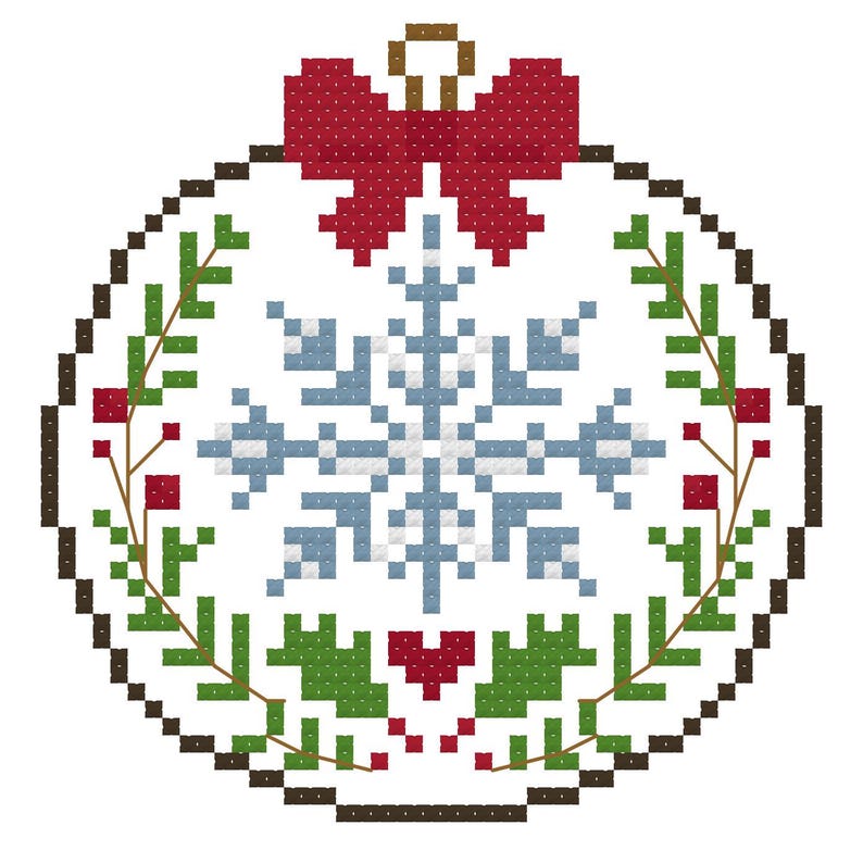 May include: A cross-stitch pattern of a circular Christmas ornament featuring a central light blue and white snowflake, a red bow at the top, and green pine branches with red berries framing the bottom and sides, all outlined in dark brown.