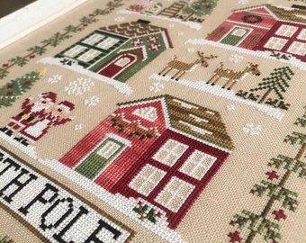 Country Cottage Needleworks GREETINGS From The NORTH POLE  - Christmas Cross Stitch