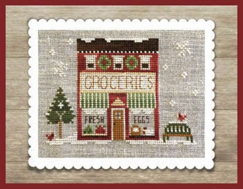 May include: A red and green shop front with the words "HOLIDAY GROCERIES" above the entrance. There is a Christmas tree, a bench, and two red birds in the snowy scene.