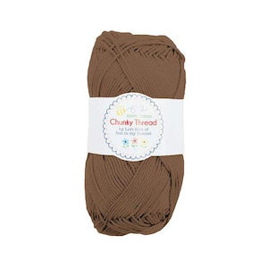 May include: A skein of brown chunky cotton yarn, labeled "100% Cotton Chunky Thread by Lori Holt of Bee in my Bonnet"