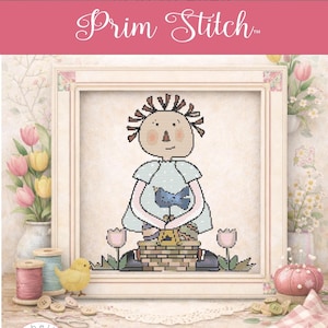 May include: Cross-stitch pattern featuring a folk art doll with a blue dress and a bird design. The doll is holding a basket, framed with a white border. The image includes the text "Prim Stitch" in a decorative font, along with floral and sewing-themed accents.