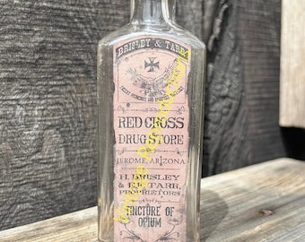 Jerome Arizona 1900-era pharmacy bottle with REPRODUCTION Old West opium label