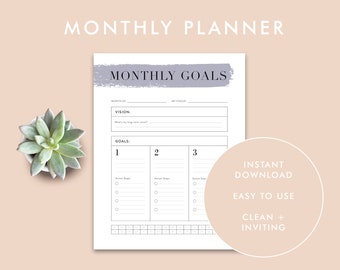 May include: A printable monthly planner with a gray and white color scheme. The planner includes sections for monthly goals, vision, and action steps. The text "MONTHLY GOALS" is written in a bold, sans-serif font.