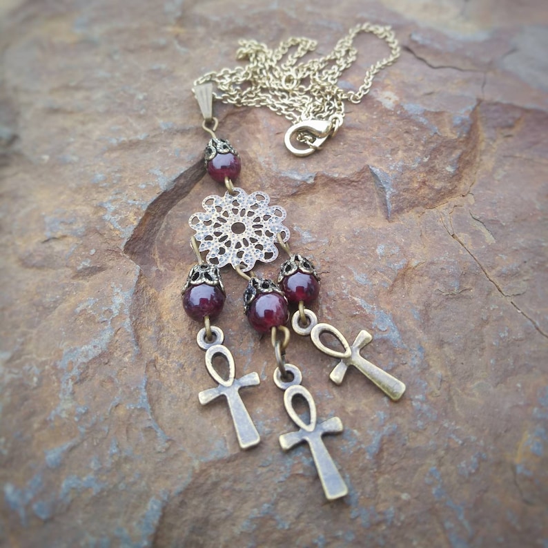 Garnet and Ankh Charm Antique Brass Finish Necklace