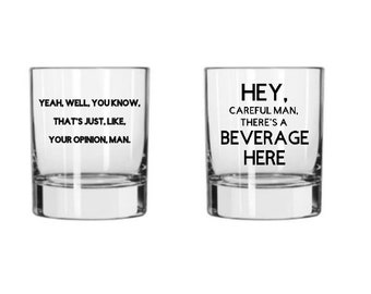 May include: Two clear glass tumblers with black text. The tumbler on the left says "Yeah, well, you know. That's just, like, your opinion, man." The tumbler on the right says "Hey, careful man, there's a beverage here."