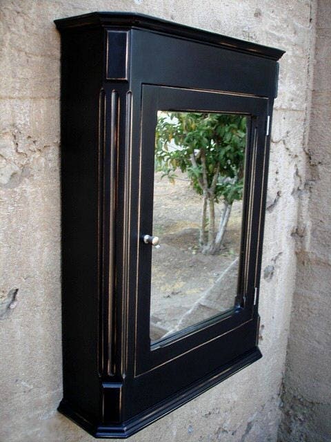 Dark wood medicine cabinet with mirror deals