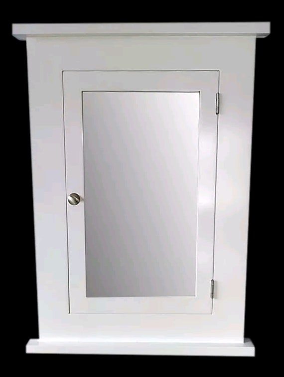 White framed medicine cabinet deals