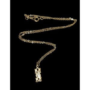 Collar con colgante vintage de Avon para el Día de la Madre en tono dorado con detalles de diamantes de imitación