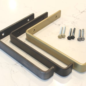 Floating metal shelf brackets available in Brass Black and Raw finish