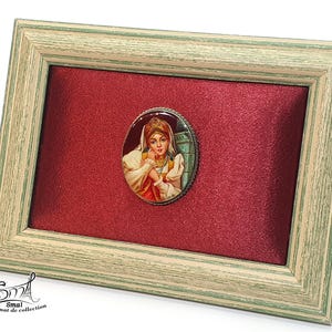 Russian folk art brooch – miniature painting of a traditional woman in costume, handcrafted on real mother-of-pearl.