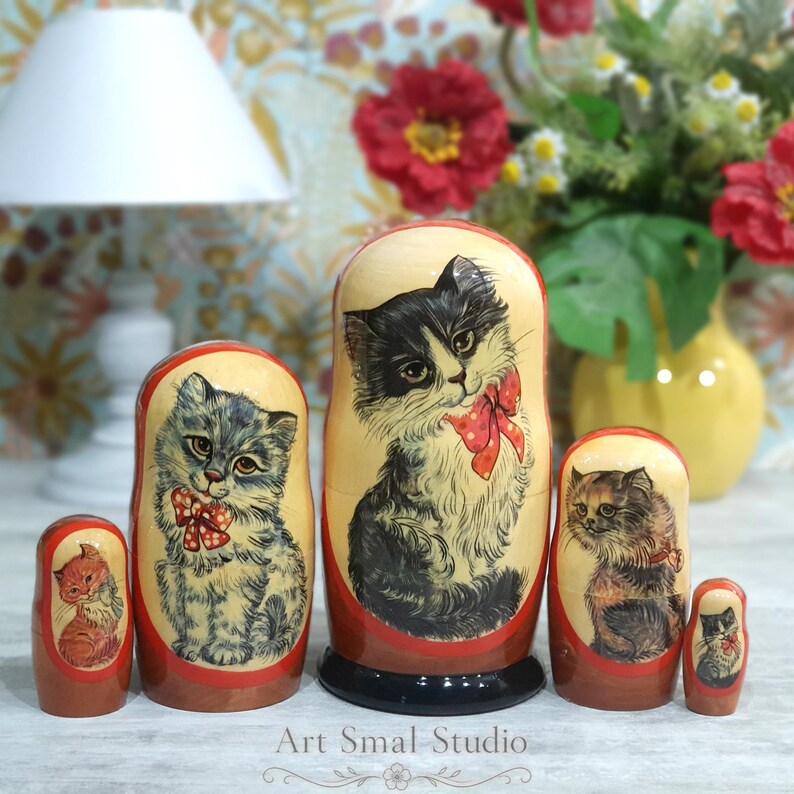 Cat matryoshka set of five hand-painted Russian nesting dolls, featuring charming gray, black, orange and tabby cat portraits with colorful bows