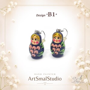 Blue Matryoshka doll earrings Design B1, handmade Russian nesting doll jewelry, wooden babushka earrings with pink flower painting, lightweight folk art dangle earrings, cute Slavic style accessory, artisan painted mini matryoshka earrings, unique gift for her by ArtSmalStudio