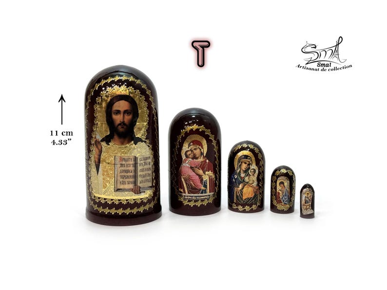 A set of five Russian religious matryoshka dolls. The largest doll, 11 cm (4.33 inches) tall, features an icon of Jesus Christ, while the four smaller nesting dolls are adorned with various other Orthodox icons.