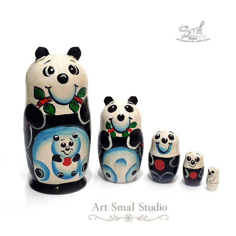 Panda matryoshka nesting dolls displayed as a five-piece Russian nesting doll set, with all dolls separated and arranged in graduated sizes on a clean white background. The largest doll measures 11 cm (4.33 inches)