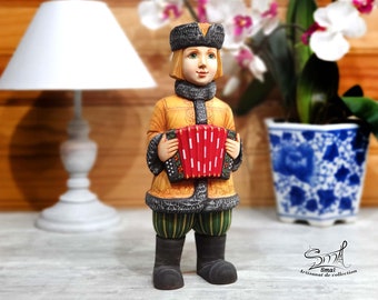 Handmade wooden carved Russian doll traditional figurine boy with accordion. Russian doll hand-painted solid wood sculpture. Ref:SBG1F