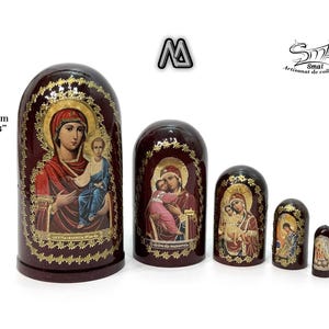 May include: A set of five nesting dolls, each featuring religious iconography. The largest doll is 4.33 inches tall and the dolls are painted in shades of red, gold, and blue. The dolls have a glossy finish and are arranged in a row.
