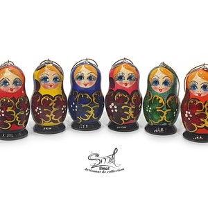 Decoration Christmas Tree ornament Russian dolls Matryoshkas. Christmas tree balls Matryoshkas Russian dolls painted wood decorations. Ref:SNM6N