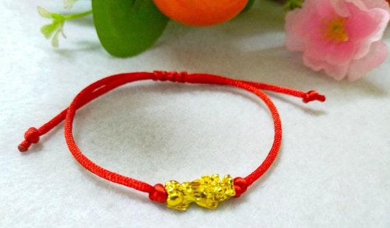 Red string feng shui best sale
