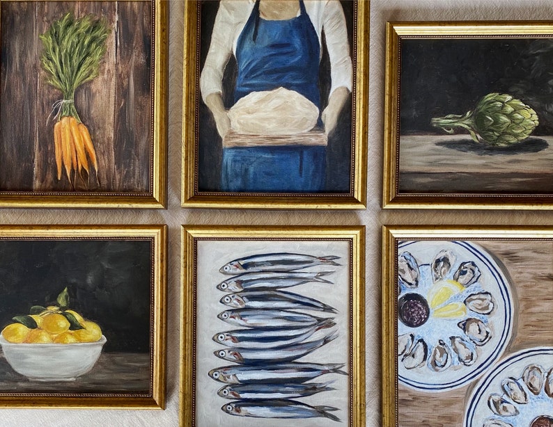 May include: A collection of six framed paintings, each depicting a different still life. The paintings are arranged in a grid pattern on a wall. The paintings include a bunch of carrots, a person holding a loaf of bread, an artichoke, a bowl of lemons, a row of fish, and a plate of oysters.