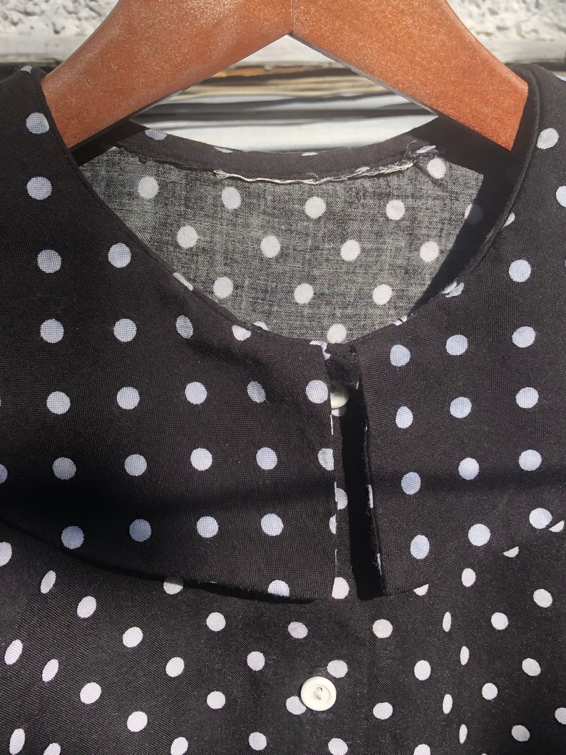Black and white polka-dot cropped button up shirt with big collar