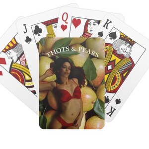 May include: A playing card with a woman in a red bikini lying on a bed of pears. The card is labeled "Thots & Pears".