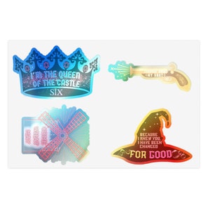 May include: A set of four holographic stickers featuring quotes and imagery from the musical Six. The stickers are rainbow coloured and feature a crown, a windmill, a gun, and a witch's hat.
