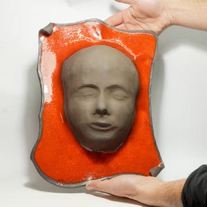 Ceramic wall mask, Red glaze on black clay, Wall art, Ceramic face, Clay art mask, Clay art, 3D wall mask, Red ceramics, Wall decor, Pottery