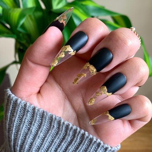 Black And Gold Almond Nails