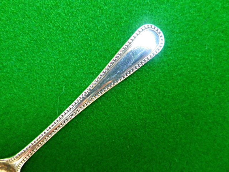 scallop shell bowl and beaded handle Victorian silver salt spoon