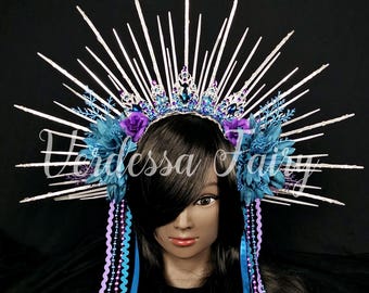 Silver Mermaid headdress with teal and purple flowers. Spiked Ocean Goddess headpiece.