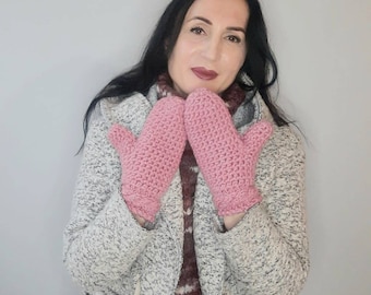 Warm hand warmers. Knitted winter gloves. A warm gift for her. Winter knitted gloves. Gloves are warm for a woman