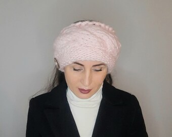 Warm ear warmer. Chunky headband. Ear warmer Braided tourniquet with button. Light pink knitted ear warmer
