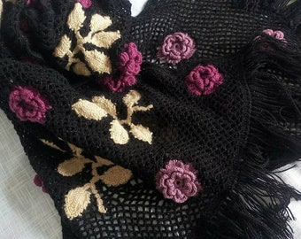 Black chic openwork knitted scarf, autumn wide, long scarf, with textured knitted flowers. Crocheted mesh scarf.