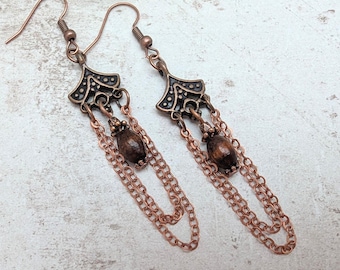 Pendientes bohemios de cobre, largos y colgantes, estilo hippie, con cuentas de madera y cadenas drapeadas.