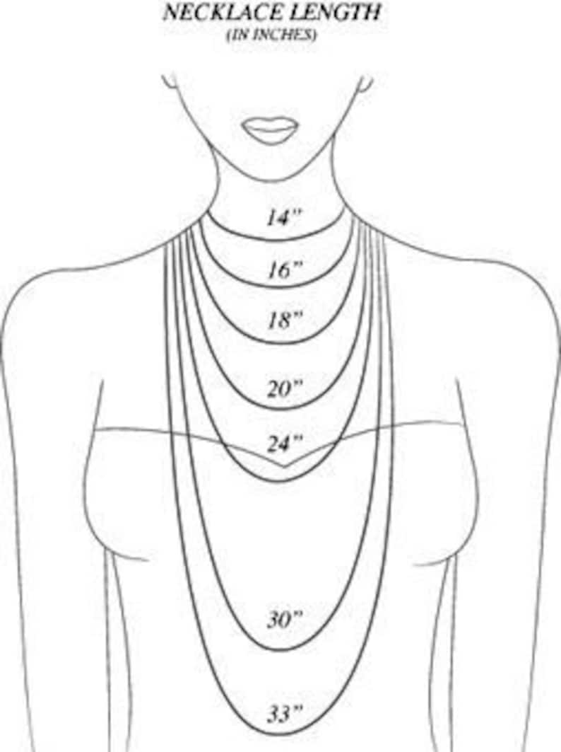 May include: A black and white line drawing of a human torso showing various necklace lengths. The text NECKLACE LENGTH (IN INCHES) appears at the top. The diagram displays seven curved lines representing lengths of 14, 16, 18, 20, 24, 30, and 33 inches.