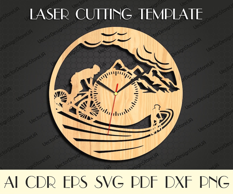May include: A laser cut wooden clock design featuring a mountain scene with a cyclist riding downhill. The clock face is in the center of the design with a red hour hand and a black minute hand.