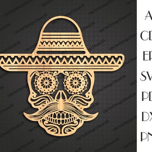 May include: A wooden cutout of a sugar skull wearing a sombrero. The skull has intricate details, including floral patterns around the eyes and a mustache.