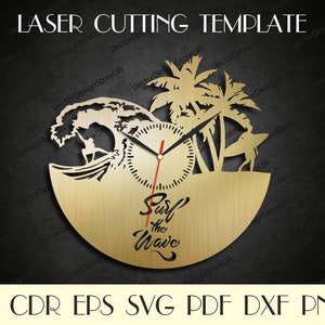 May include: Laser cut template for a clock featuring a surfer riding a wave with palm trees and the text "Surf the Wave".