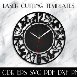 May include: Black and white clock face with butterfly and floral designs. The clock face is surrounded by a black circle with Roman numerals. The clock face is on a white background. LASER CUTTING TEMPLATES AI CDR EPS SVG PDF DXF PNG