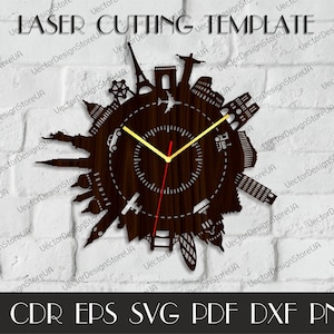 May include: A laser cut clock design featuring a brown wooden background with a clock face and a silhouette of famous landmarks from around the world. The text "LASER CUTTING TEMPLATE" is at the top of the image. The text "AI CDR EPS SVG PDF DXF PNG" is at the bottom of the image.