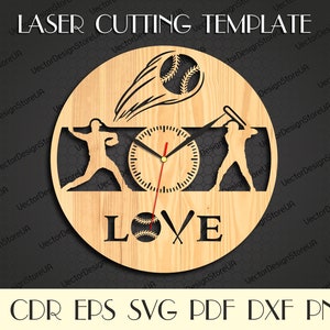 May include: A wooden clock with a baseball theme. The clock face is surrounded by a baseball player swinging a bat and another player catching a ball. The word "LOVE" is written below the clock face with a baseball and crossed bats.