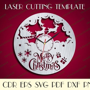 May include: A laser-cut Christmas clock template with a festive design. It features Santa's sleigh and reindeer, snowflakes, and the words "Merry Christmas." The clock hands are black, set against a red background. The text "LASER CUTTING TEMPLATE" is at the top.